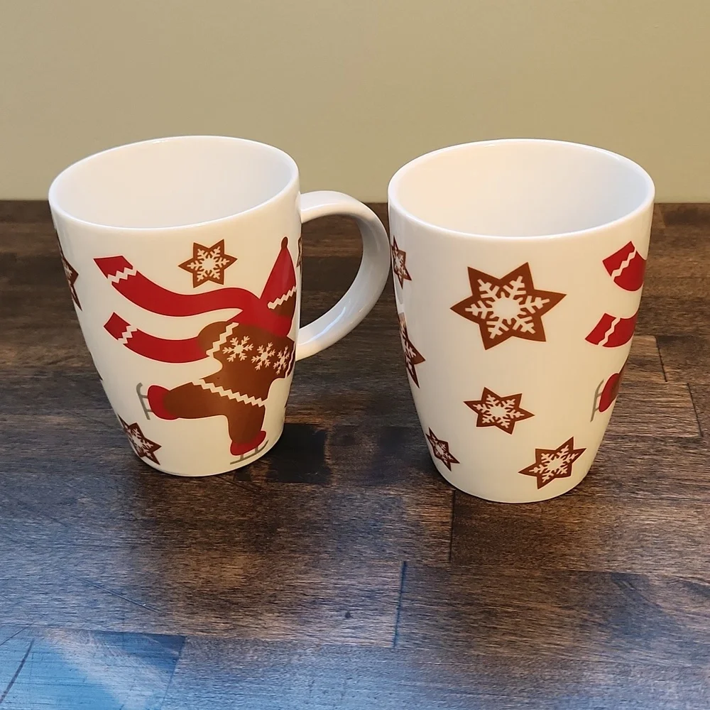 Set of ice skating gingerbread man mugs Crate & Barrel